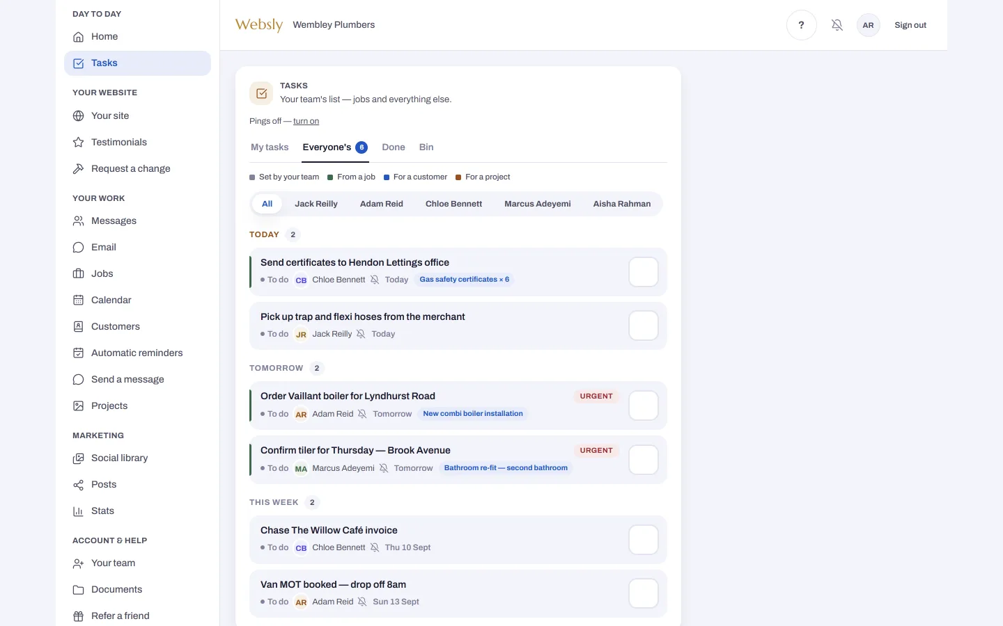 The Websly app tasks screen on a laptop